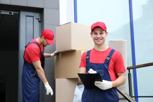 Staff packing computers and office equipment for a Battersea office move