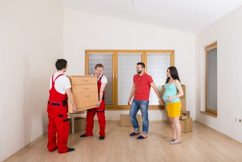 People following safe procedures in a storage facility corridor and access area