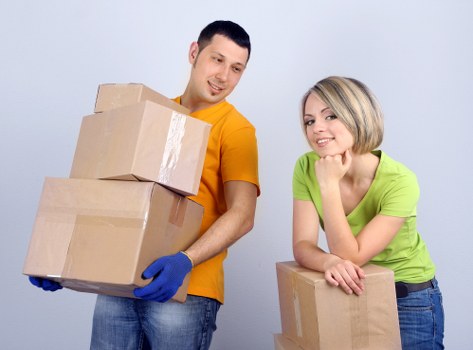 Moving team handling furniture in Battersea